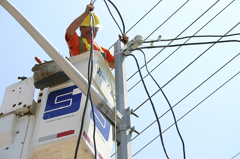 electrical worker working on power lines