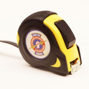 Photo of a measuring tape with IBEW Local 353 Toronto logo on the side